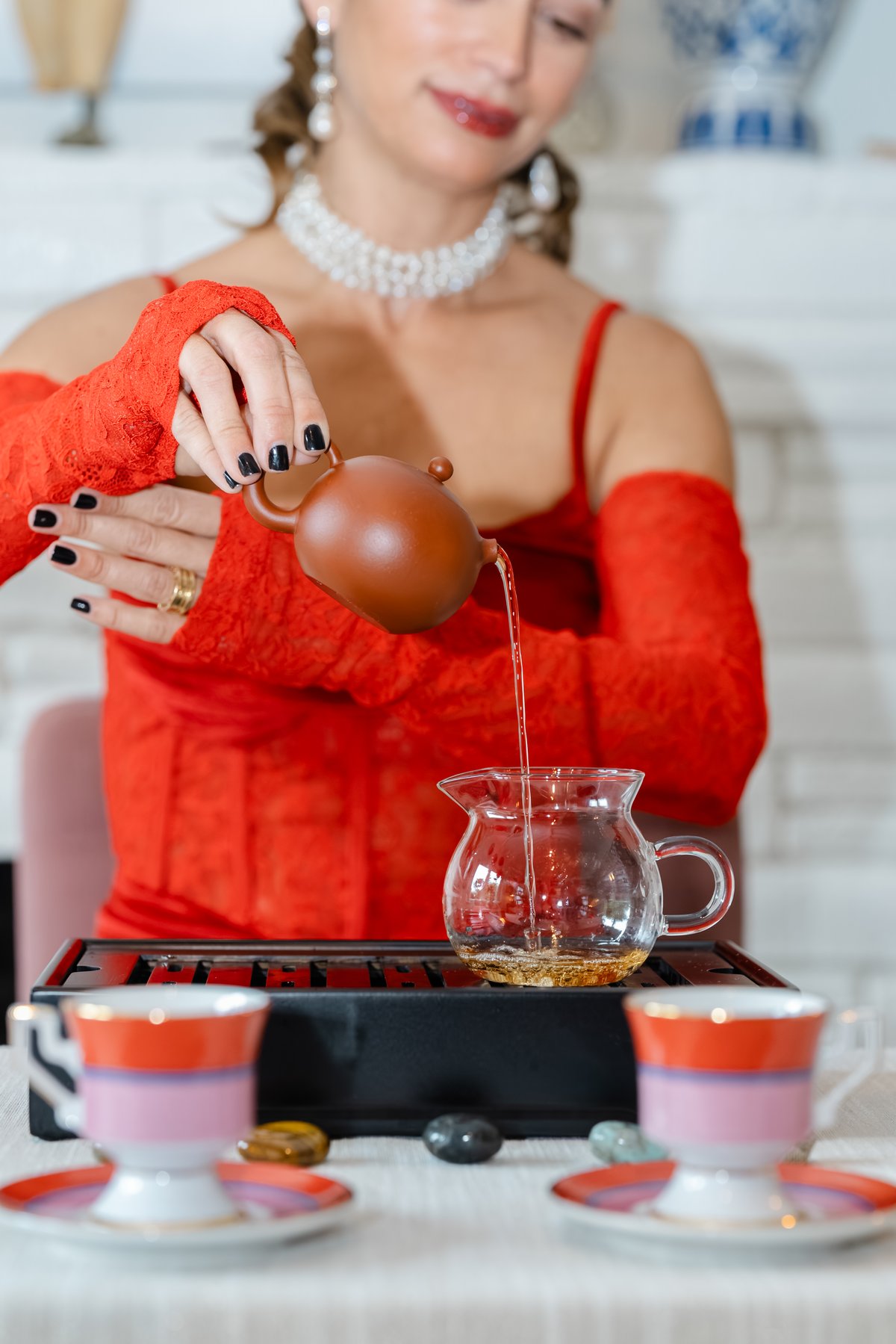 Ana pouring tea